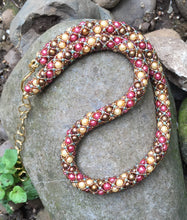 Load image into Gallery viewer, Netted Treasure style beaded Necklace Swarovski Glass Pearls : Rose, Cream, Matte Bronze  Seed beads : Iridescent Rootbeer and Sage green Hook and Eye Closure - Adjustable  Necklace measures from 16 1/2 to 19 1/2 inches  These warm tones are reminiscent of the budding rose garden in late Spring.