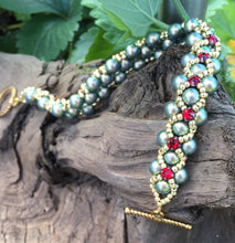 Load image into Gallery viewer, Beaded Bracelet - Pearl Monster - Iridescent Green Glass Pearl and Siam Red