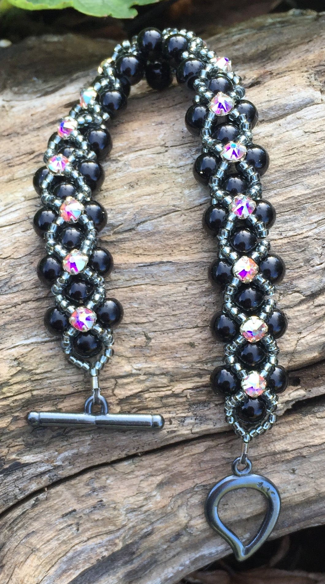 This striking Black glass Pearl and Dark Gray Seed Bead Montee bracelet measures 7 1/8