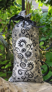 This Black and Silver Scrollwork Lavender pillow is useful in diminishing stress, easily fits on your bed or couch (or car) and makes a unique gift. The contents of each pillow is lavender, and only lavender, thus there are no other fillers. Lavender has plenty of its own natural oils, so give it a gentle squeeze to slightly bruise the buds to draw out more fragrance. This pillow should not be heated or put into a microwave oven.