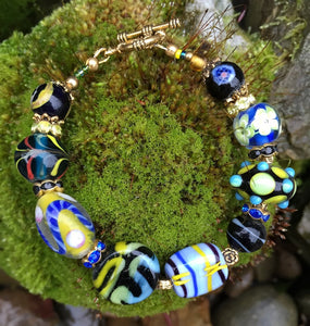 Aqua Blue Recycled Glass Bracelet with Fossilized Stegodon Beads –  LAND+LAKE+SEA Jewelry