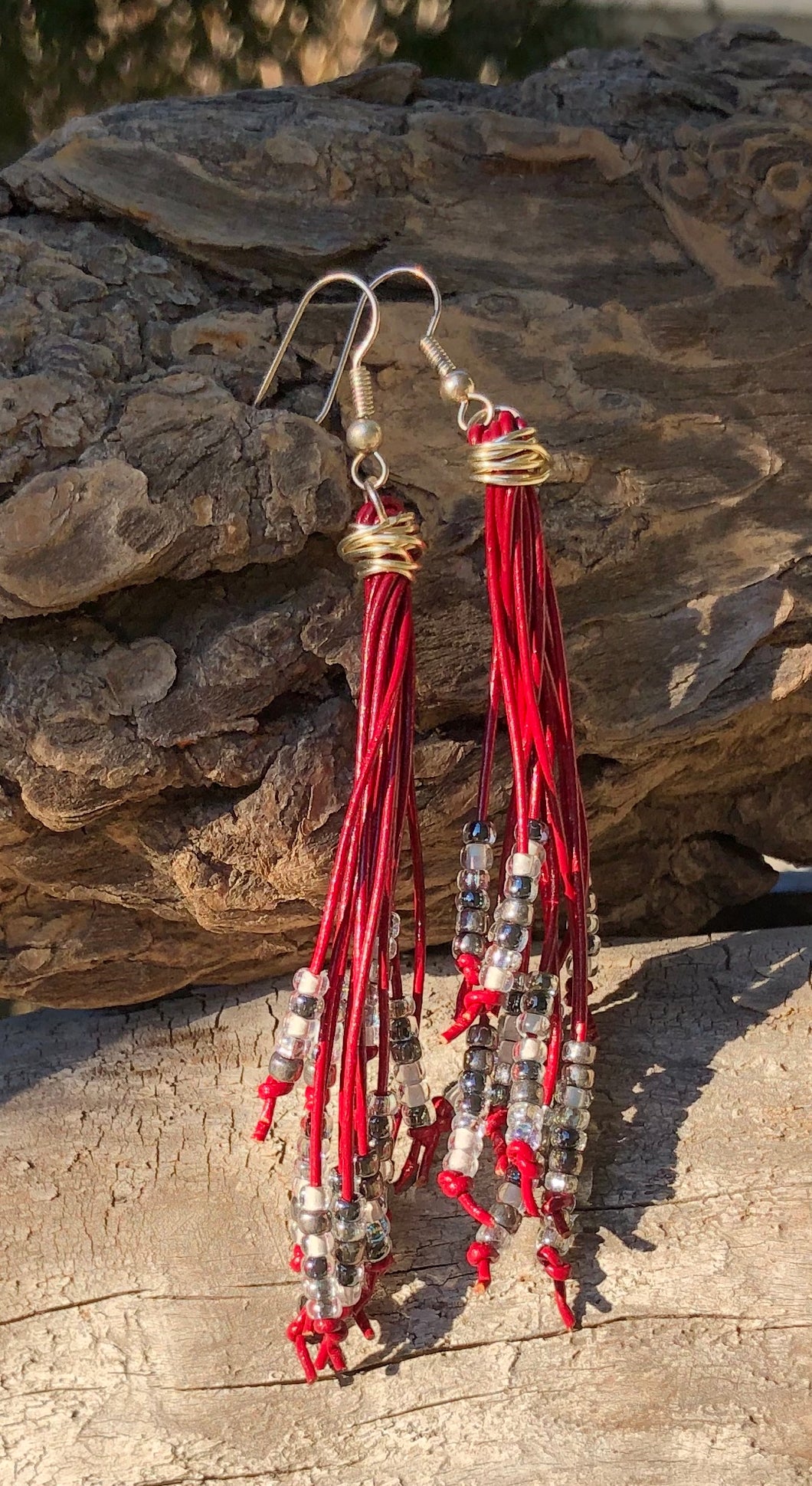 These Cattail Style Red Leather Earrings with sparkly Black Silver and Clear beads measure approximately 3 1/2