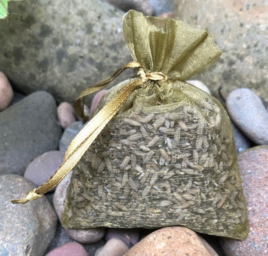 This Bronze Organza Lavender Sachet is useful in diminishing stress, easily fits in a drawer, purse, gym bag, or locker and makes a unique gift. The contents of each sachet is Oregon lavender, and only lavender, thus there are no other fillers. Lavender has plenty of its own natural oils, so give it a gentle squeeze to slightly bruise the buds to draw out more fragrance. This sachet should not be heated or put into a microwave oven.